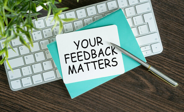 Text your Feedback matters on White Paper Background, Business concept.