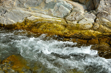 water flowing over rocks