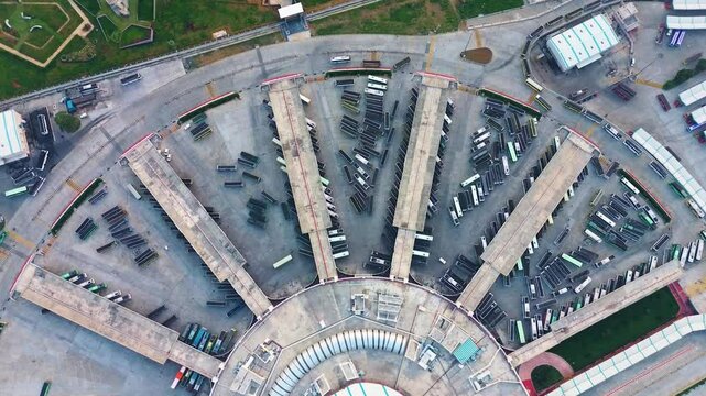A top-down aerial timelapse of the vast Kalaignar Centenary Bus Terminus in Kilambakkam, Chennai. The world's largest bus terminal.