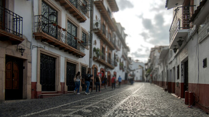 Obraz premium Charming streets of Taxco, Mexico with vibrant architecture and a lively atmosphere