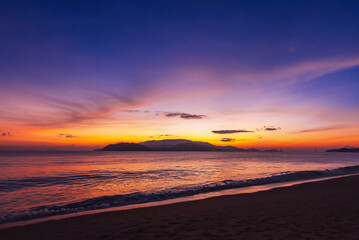 Sunrise. Clouds over the sea in the morning with orange, yellow sunlight