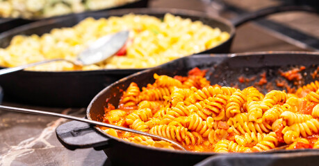 A tempting plate of fusilli pasta coated in savory tomato sauce, capturing the essence of Italian comfort food.