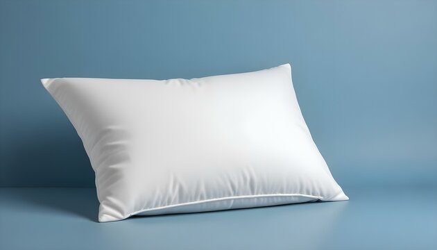 Una almohada blanca sobre un fondo azul