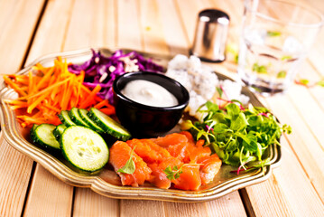 Salmon with Vegetables and Sour Cream Sauce