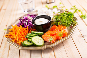 Salmon with Vegetables and Sour Cream Sauce