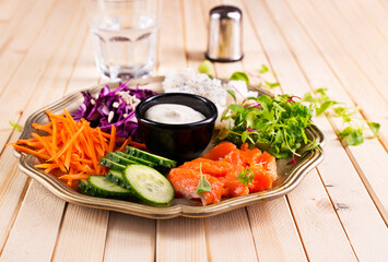 Salmon with Vegetables and Sour Cream Sauce