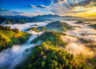 Fototapeta premium Aerial View of the Enchanting Sea of Fog in Mae Hong Son, Thailand: A Stunning Morning Landscape with Blue Sky and Lush Valleys Perfect for Unseen Travel Inspiration