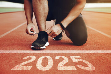 New year 2025 concept, beginning of success. Start to new year 2025 plans. Start of Man running on...