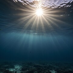 Obraz premium Dark blue ocean surface seen from underwater with sunrays