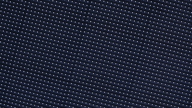 A mesmerizing array of illuminated pixels, captured in close up, reveals a vibrant, textured background of countless white dots, symbolizing the digital revolution, pattern of luminous white dots