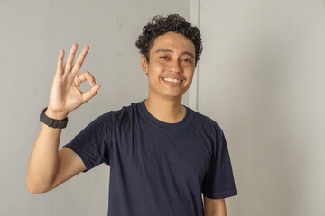 Smiling Man Showing Okay Sign