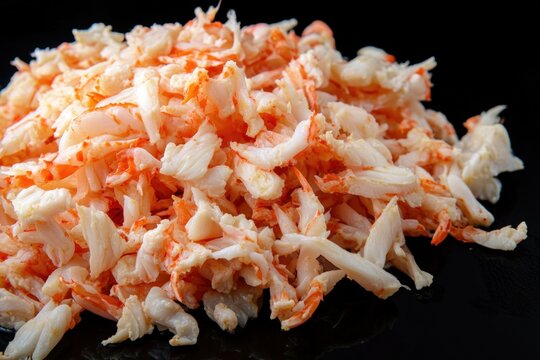 Crabmeat. Healthy Seafood Ingredient Set on Black Background with Mixed Brown and White Crabmeat