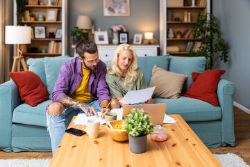 Portrait of success business people working together in home office. Couple teamwork startup concept. Freelance work of professional occupation millennial man and woman finance and economy statistics