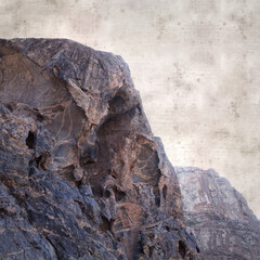 textured stylish old paper background, square, with landscape of Gran Canaria, around the Dog of Bentayga rock formation 