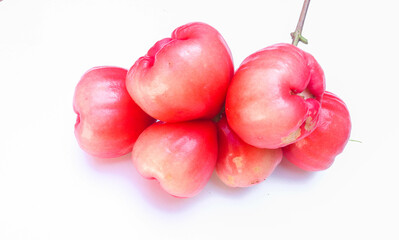 Water guava or Myrtaceae is a type of juicy guava fruit. Ripe red water apple and its leaves isolated on white background