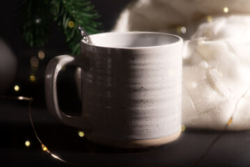 Steaming cup of coffee over a cityscape background