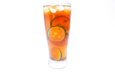 Glass of iced tea with lemon, lime and ice cubes isolated on white background. A glass of sweet iced tea filled with lemon slices