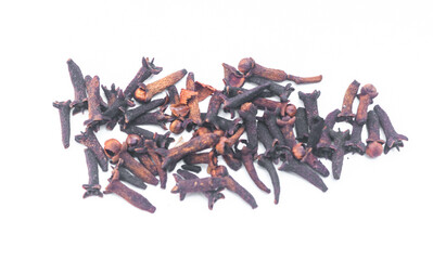 cloves or Syzygium aromaticum on a white plate isolated on white background.