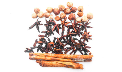 Group of cardamom, cinnamon, star anise, anise seed, clove, coriander seeds, isolated on white background. Collect natural spices