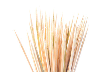 stack of bamboo skewers for making satay or barbeque on white background