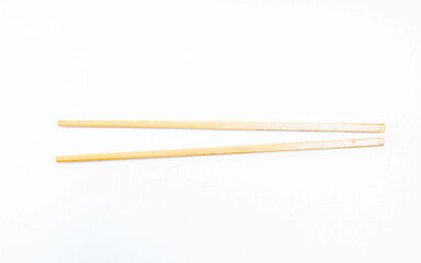 Traditional wooden chopsticks isolated on white background.