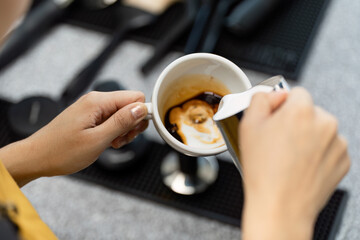 Barista Crafting Coffee in a Modern Startup Cafe - Small Business Atmosphere with Freshly Brewed Espresso