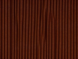 Obraz premium Brown striped velvet fabric close-up.