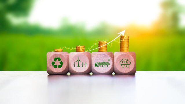 Green energy invest instead gold coins growing. digital financial chart graphs and stock market.Green energy in full development. Investing in the environment, governance Investing in the industrial.