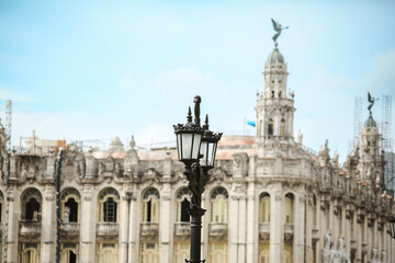 Historic Havana street lamp with elegant architecture of Cubas past in the background