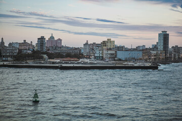 A beautiful evening view of Havana, Cubas skyline along the waterfront with gentle waves
