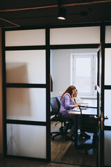 Schoolgirl and teacher have a lesson in the office, private lessons, distance learning