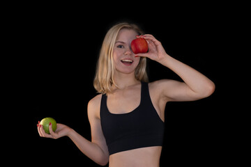 Cheerful Girl Holding Green and Red Apples, Playfully Promoting Healthy Lifestyle and Nutrition