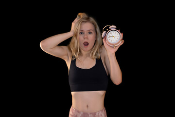 Shocked Girl Holding Alarm Clock – Morning Stress and Time Management