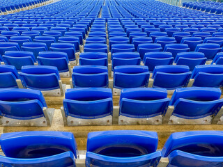Fototapeta premium stadium stands with closed blue seats