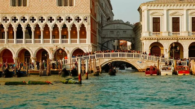 Establishing shot of Venice, Italy, revealing the Bridge of Sighs, Palazzo Ducale (Doge's Palace), Piazza San Marco (St Mark's Square) and the famous gondolas