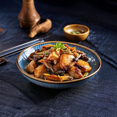 chinese food:chicken with shiitake and wood ear mushrooms, in plate