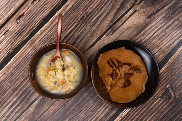 Sweet potato lily golden rice porridge with brown sugar steamed bread