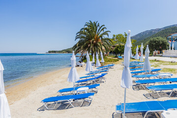 Picturesque sandy beach in Greece perfect summer vacation destination for relaxation by the sea.