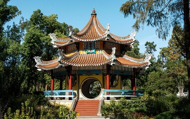 Chinese pavilion in greenery