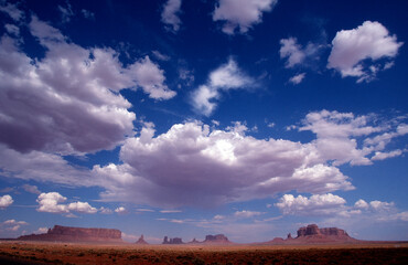 Clouds, blue sky and monument valley