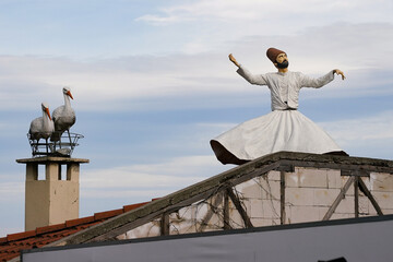 Stork and whirling dervish statue in Bursa, Turkiye