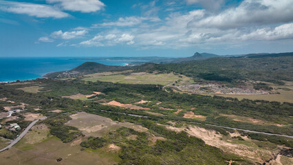 Obraz premium View of Longpan Park in Taiwan featuring lush landscapes and coastal scenery under a clear sky