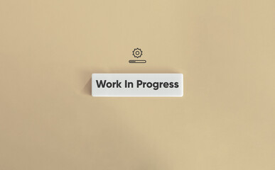 Work In Progress Phrase and Concept Image. Text on Block Letter Tile on Solid Background....