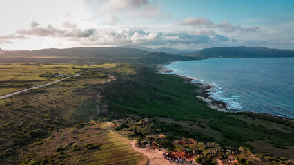 Scenic coastal view of Taiwan showcasing lush landscapes and tranquil waters during sunset