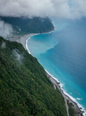 Aerial view of Taiwan stunning coastline with lush greenery and turquoise blue waters