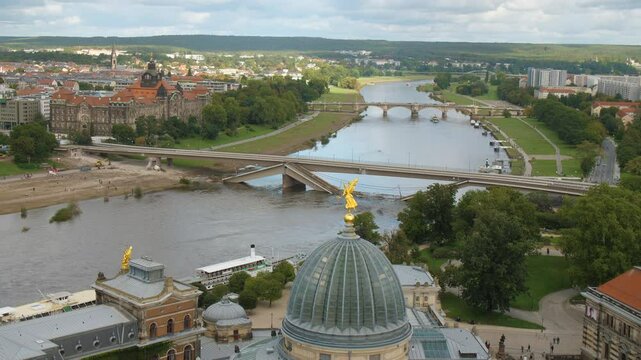 Dresden Sachsen, destroyed Carolabr&uuml;cke Carola Bridge over the Elbe Germany Aerial View from the top of Frauenkirche cloudy sky with Historic and Modern Architecture, Red-Roofed Buildings