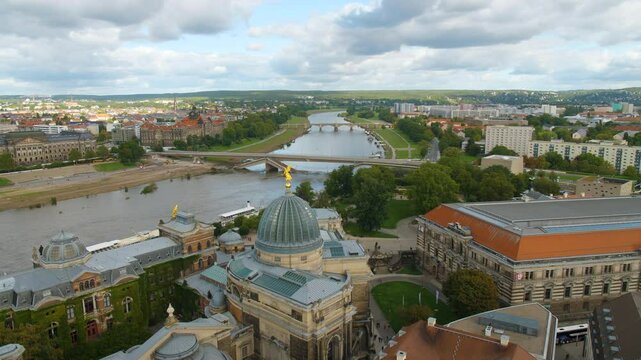 Dresden Sachsen, destroyed Carolabr&uuml;cke Carola Bridge over the Elbe Lipsius-Bau Germany Aerial View from the top of Frauenkirche pan move cloudy sky with Historic and Modern Architecture