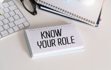 Know your role written on a memo stick Notepad. Inspiration.