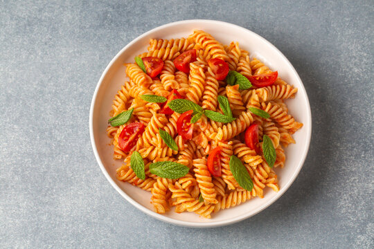 Fusilli pasta, spiral or spirali pasta with tomato sauce - Italian food style
