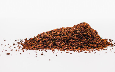 Ground coffee powder or fresh coffee grain isolated on white background